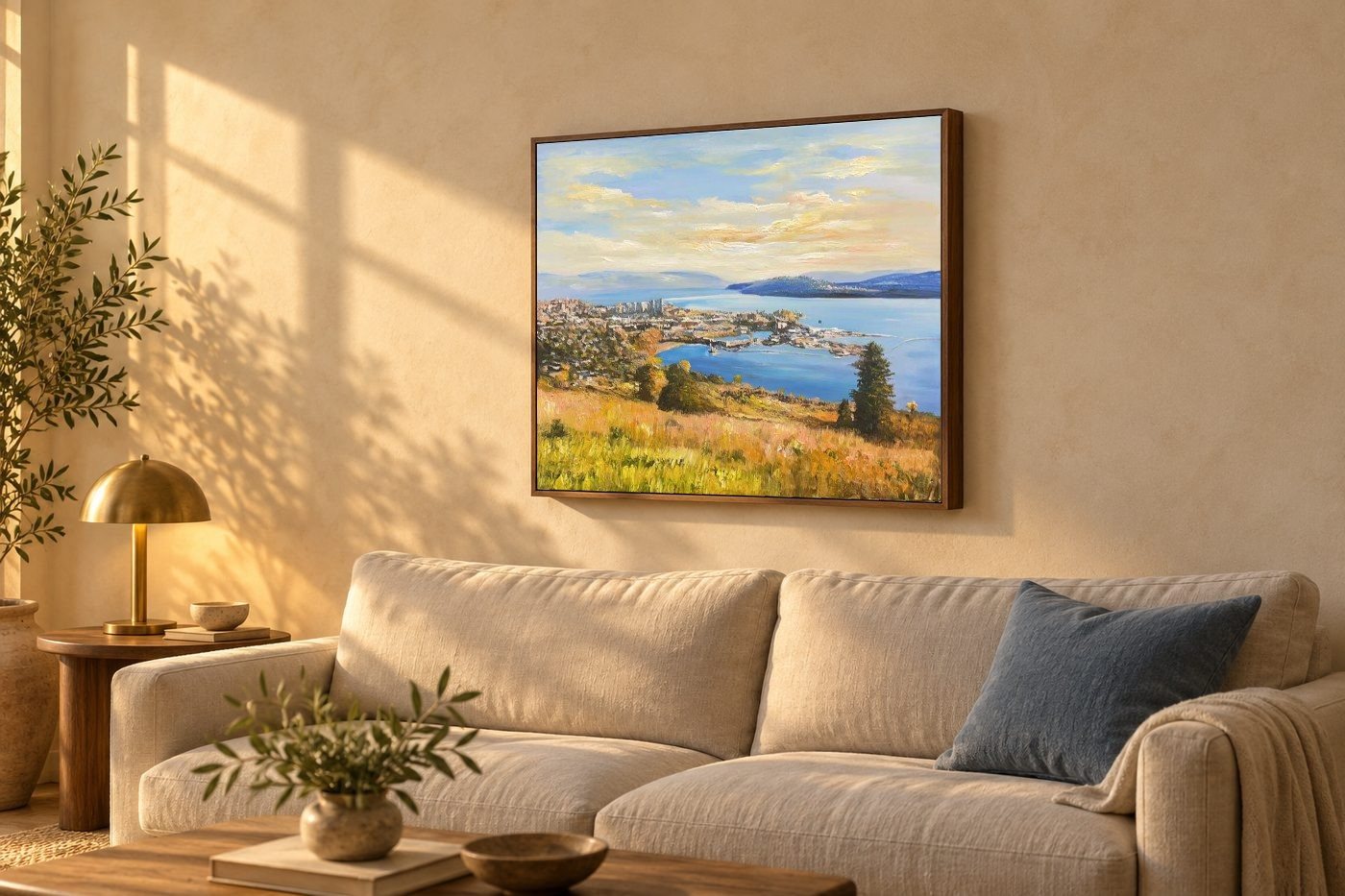 The corrected photo hanging in a living room above a linen sofa